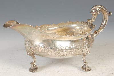 Lot 15 - A George III Scottish silver sauce boat with...