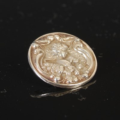 Lot 105 - A set of six Art Nouveau silver buttons, by...