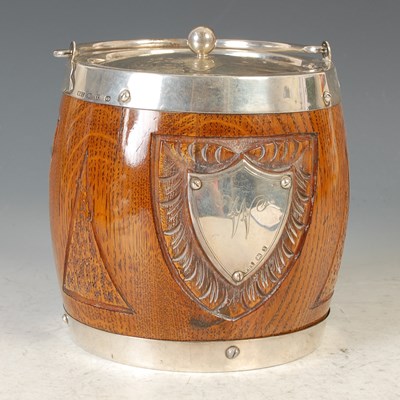 Lot 154 - A late Victorian silver-mounted oak biscuit...