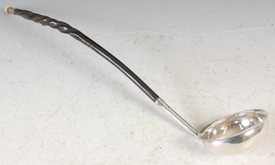 Lot 108 - A punch ladle with part spiral whalebone stem...