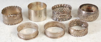 Lot 152 - Seven various silver napkin rings comprising:...
