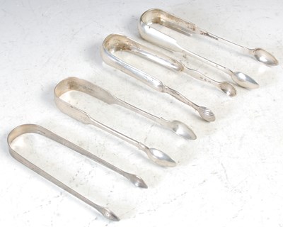 Lot 201 - Four various pairs of silver sugar tongs to...