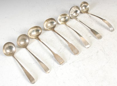 Lot 170 - Seven various Scottish silver toddy ladles: an...