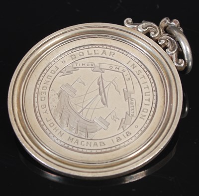 Lot 51 - A Scottish silver circular school prize medal,...