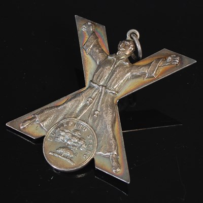 Lot 42 - St Andrews interest, a silver cross-shaped...
