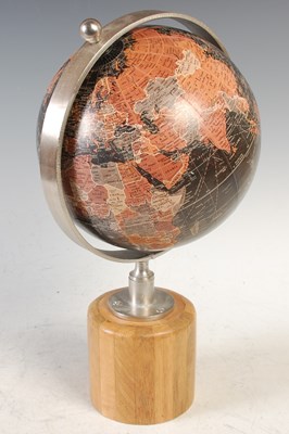 Lot 629 - A modern table globe raised on a turned wooden...