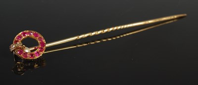 Lot 361 - A late 19th century yellow metal tie pin, set...