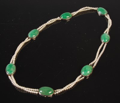 Lot 291 - Attributed to Cartier, a jade and seed pearl...