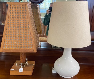 Lot 876 - A mid-century modern wooden table lamp with a...