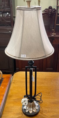 Lot 632 - An Art Deco style table lamp and shade 83cm high.