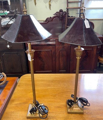 Lot 633 - A pair of gilt metal table lamps and shades,...
