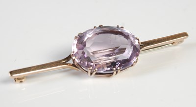 Lot 424 - A 9ct gold and amethyst brooch, set with a...