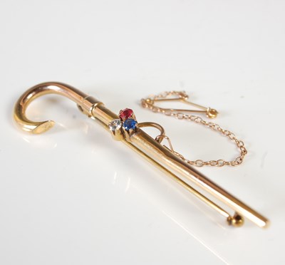 Lot 426 - An Edwardian gold brooch formed as a walking...