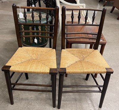 Lot 852 - A pair of Arts & Crafts Sussex style chairs...