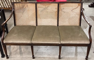 Lot 858 - A George III style mahogany triple chair back...