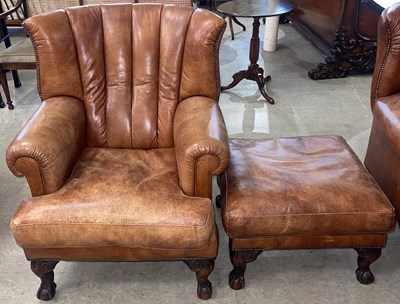 Lot 864 - A modern tan leather and brass studded...