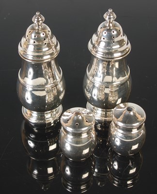 Lot 234 - A pair of Birmingham silver pepper pots;...