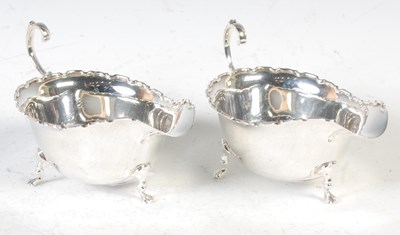 Lot 250 - A pair of Birmingham silver sauce boats, 4.9...