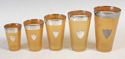 Lot 258 - A leather cased set of five graduated tapered...