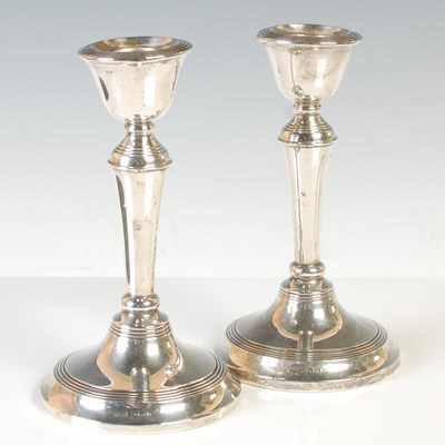Lot 261 - A pair of Birmingham silver candlesticks, 14cm...