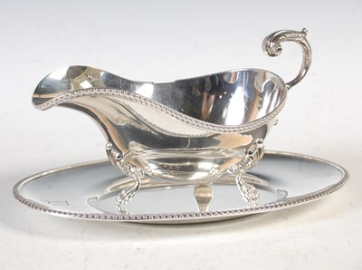Lot 262 - A Birmingham silver sauce boat and oval silver...