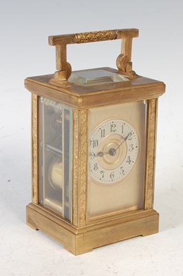 Lot 266 - An early 20th century brass cased carriage...