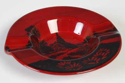 Lot 270 - A Royal Doulton flambe ashtray decorated with...