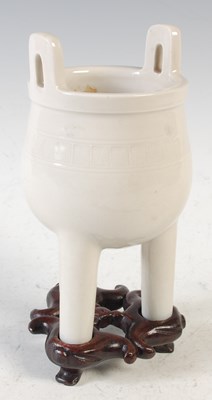 Lot 272 - A Chinese porcelain blanc-de-chine ding-form...