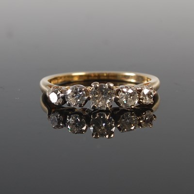 Lot 298 - A white and yellow metal five stone diamond...