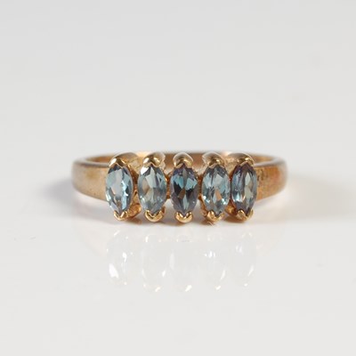 Lot 302 - A 9ct gold Alexandrite five stone dress ring,...