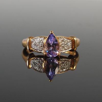 Lot 304 - A 9ct gold tanzanite and diamond dress ring,...