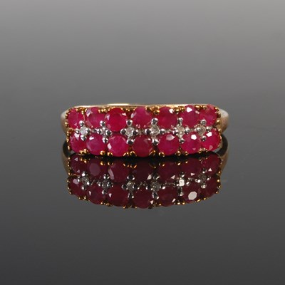 Lot 308 - A 9ct gold ruby and diamond chip dress ring,...