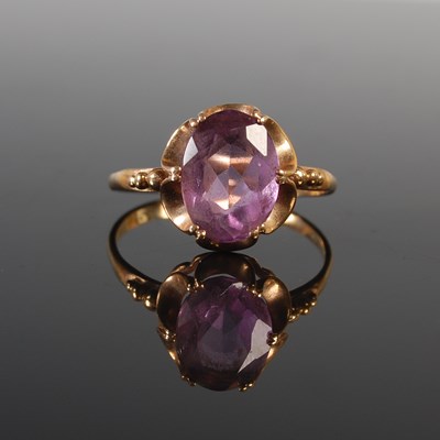 Lot 309 - A 9ct gold and amethyst single stone ring, the...