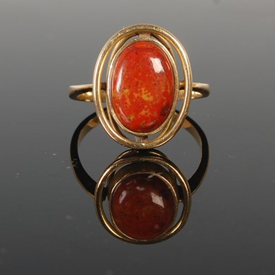 Lot 314 - A yellow metal single stone dress ring, set...