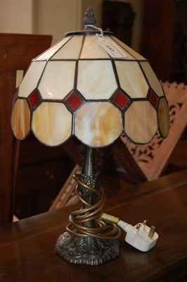 Lot 637 - A Tiffany style leaded glass table lamp and shade