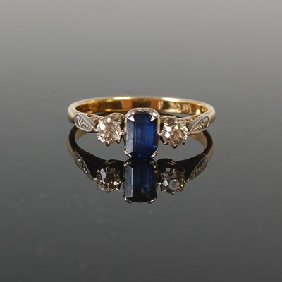 Lot 320 - A yellow and white metal sapphire and diamond...