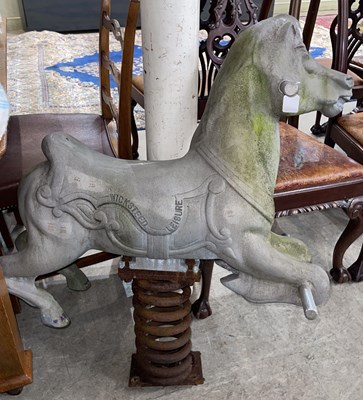 Lot 891 - A vintage metal playground rocking carousel...