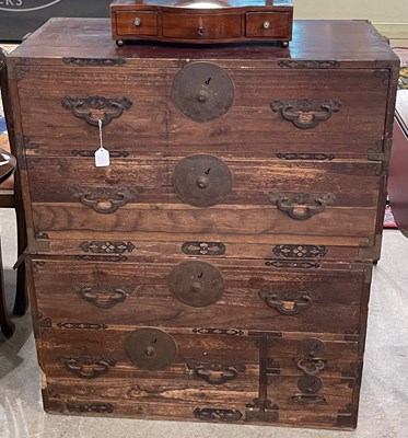 Lot 893 - A four drawer two part campaign type chest in...