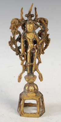 Lot 390 - A Chinese gilt bronze figure of Guanyin,...