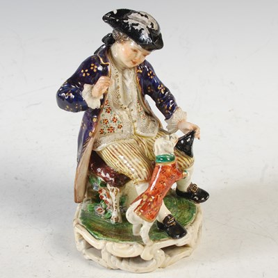 Lot 396 - An antique Derby porcelain figure of boy and...