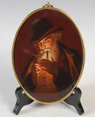 Lot 399 - A Continental hand painted porcelain plaque...