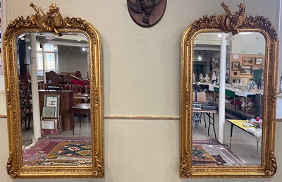 Lot 808B - A pair of decorative gilt framed pier mirrors,...