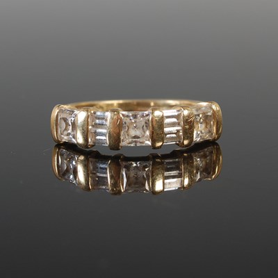 Lot 329 - A 14ct gold and diamond half hoop ring, set...