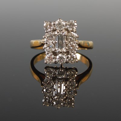 Lot 333 - An 18ct gold and diamond set cluster ring,...