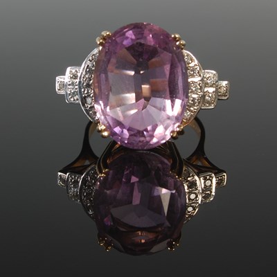 Lot 337 - A 9ct gold amethyst and diamond set dress ring,...