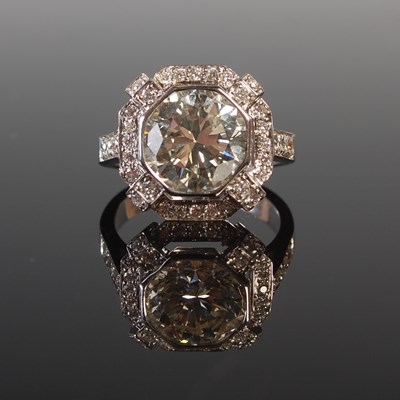 Lot 342 - A white metal diamond set dress ring, centred...