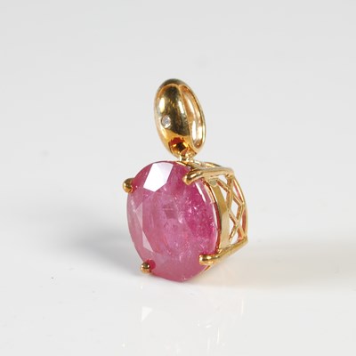 Lot 365 - A 9ct gold Royal Ruby and diamond set pendant,...