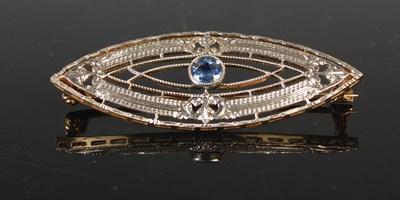 Lot 458 - A 20th century white and yellow metal oval...