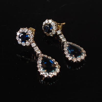 Lot 435 - A pair of white and yellow metal sapphire and...