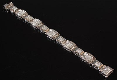Lot 437 - A white metal and diamond set articulated...